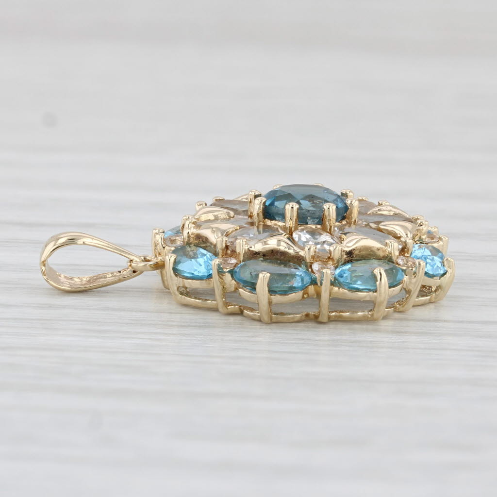 Light Gray 6ctw Blue White Topaz Flower Pendant 14k Yellow Gold