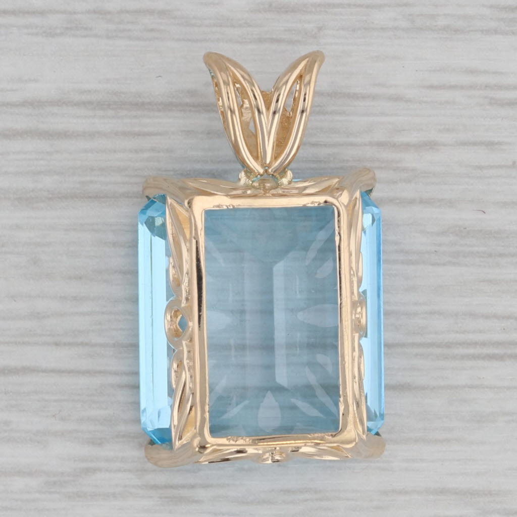 Gray 23.30ct Blue Topaz Emerald Cut Solitaire Pendant 14k Yellow Gold