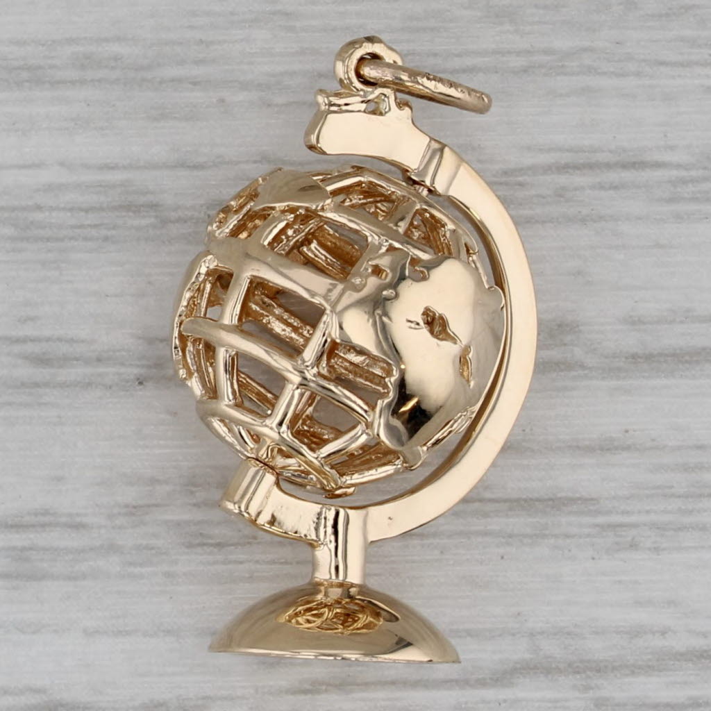 Dark Gray Spinning Globe Charm 14k Yellow Gold Pendant