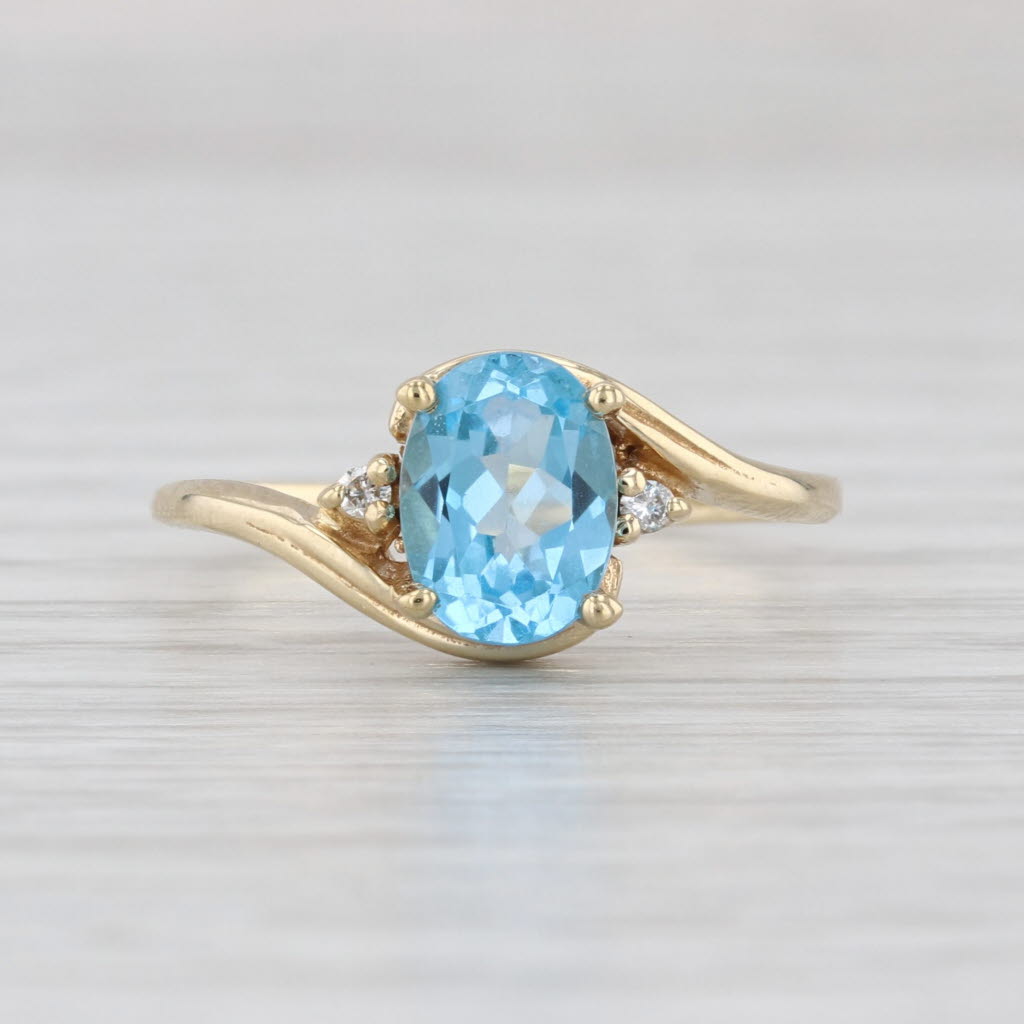 1.53ctw Oval Blue Topaz Diamond Bypass Ring 14k Yellow Gold Size 7.75