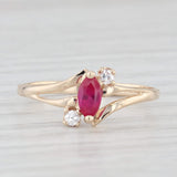 0.39ctw Lab Created Ruby Cubic Zirconia Ring 10k Yellow Gold Size 7 Bypass