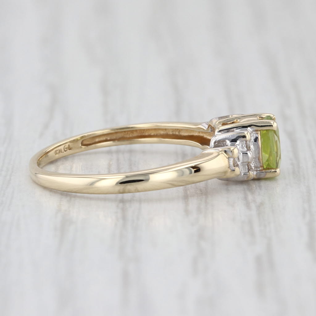 0.58ctw Oval Peridot Diamond Ring 10k Yellow Gold Size 7.25