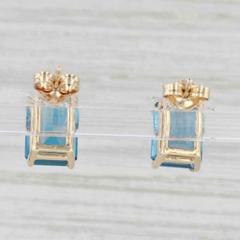 Light Gray 6ctw Solitaire London Blue Topaz Stud Earrings 14k Yellow Gold Emerald Cut Studs
