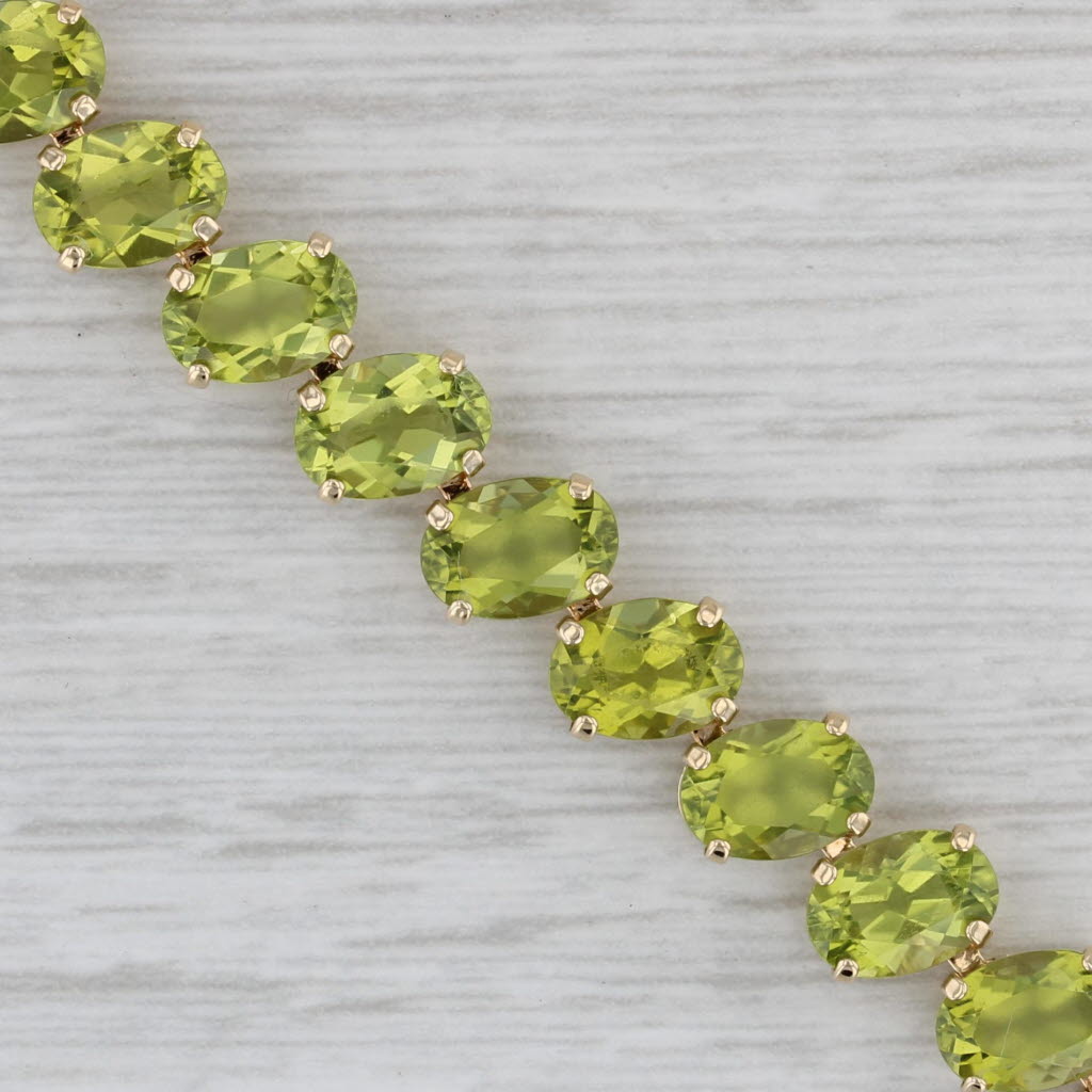 Gray 27ctw Peridot Tennis Bracelet 14k Yellow Gold 8" 7.1mm