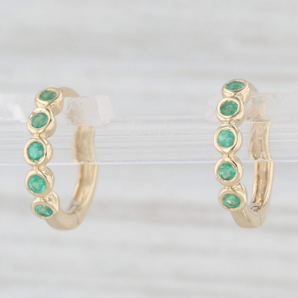 Light Gray New 0.10ctw Emerald Small Hoop Huggie Earrings 10k Yellow Gold