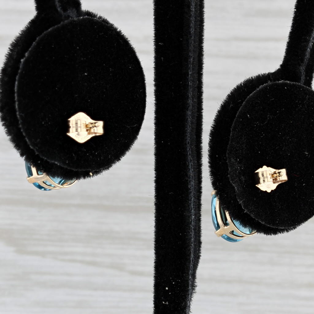 Light Gray 4ctw Oval Blue Topaz Stud Earrings 14k Yellow Gold