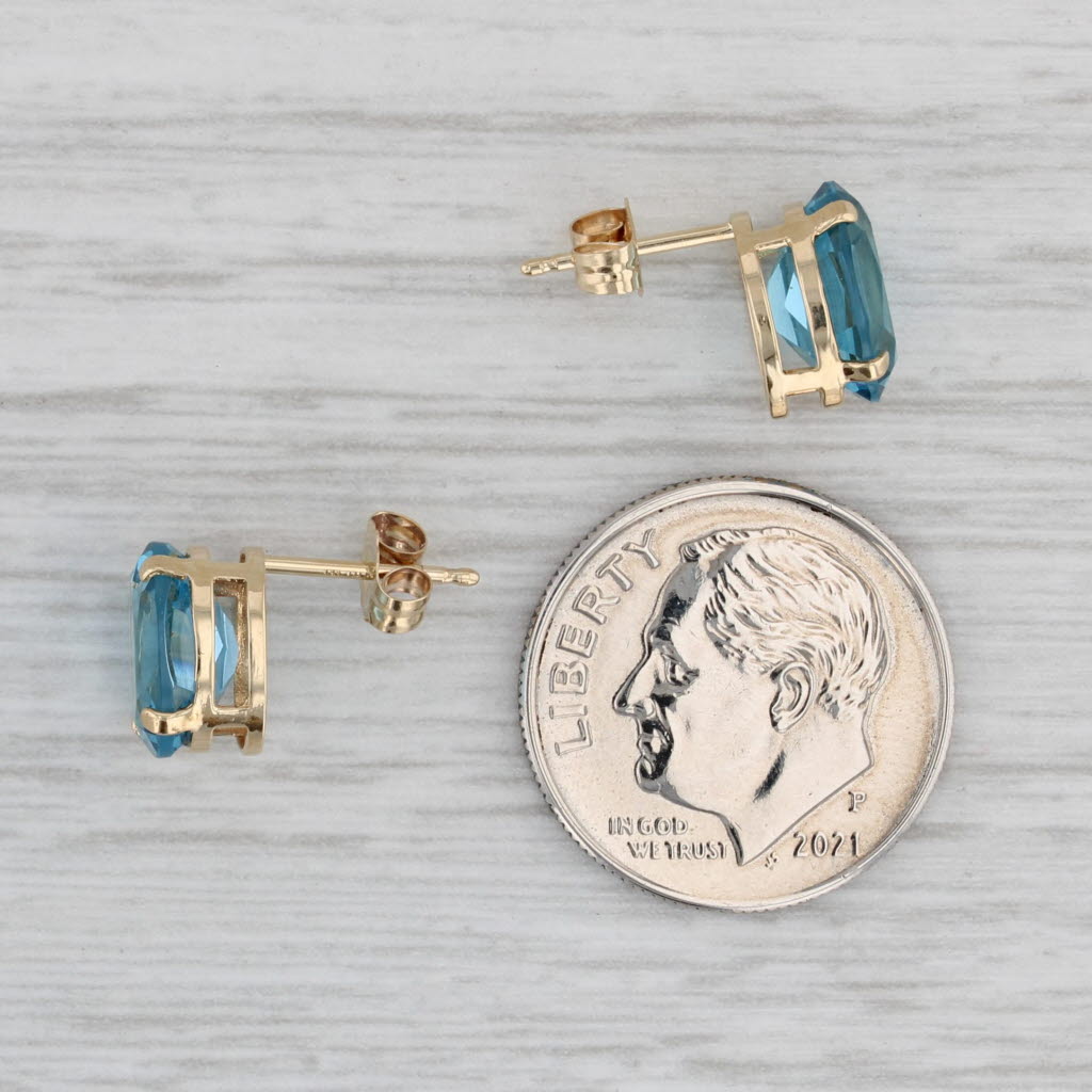 Gray 4ctw Oval Blue Topaz Stud Earrings 14k Yellow Gold