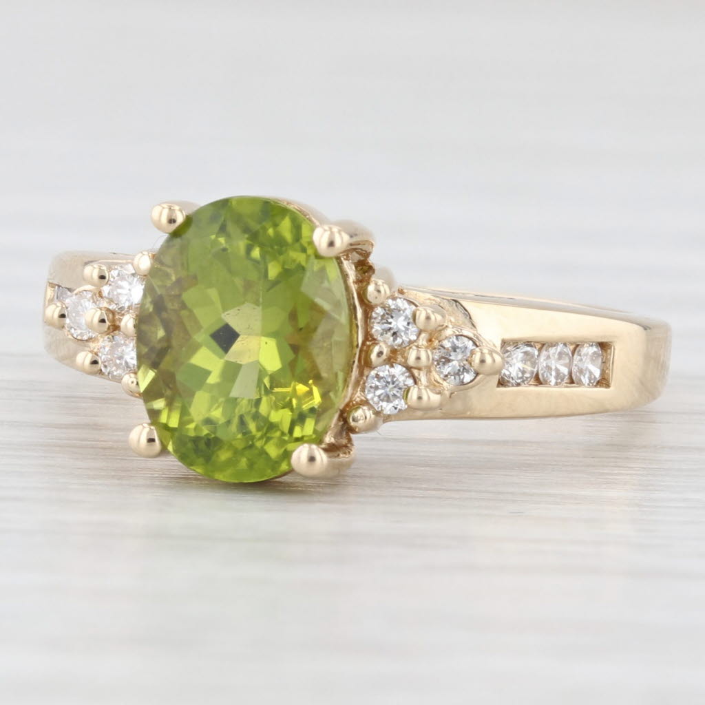 Light Gray 2.20ctw Oval Green Peridot Diamond Ring 14k Yellow Gold Size 7