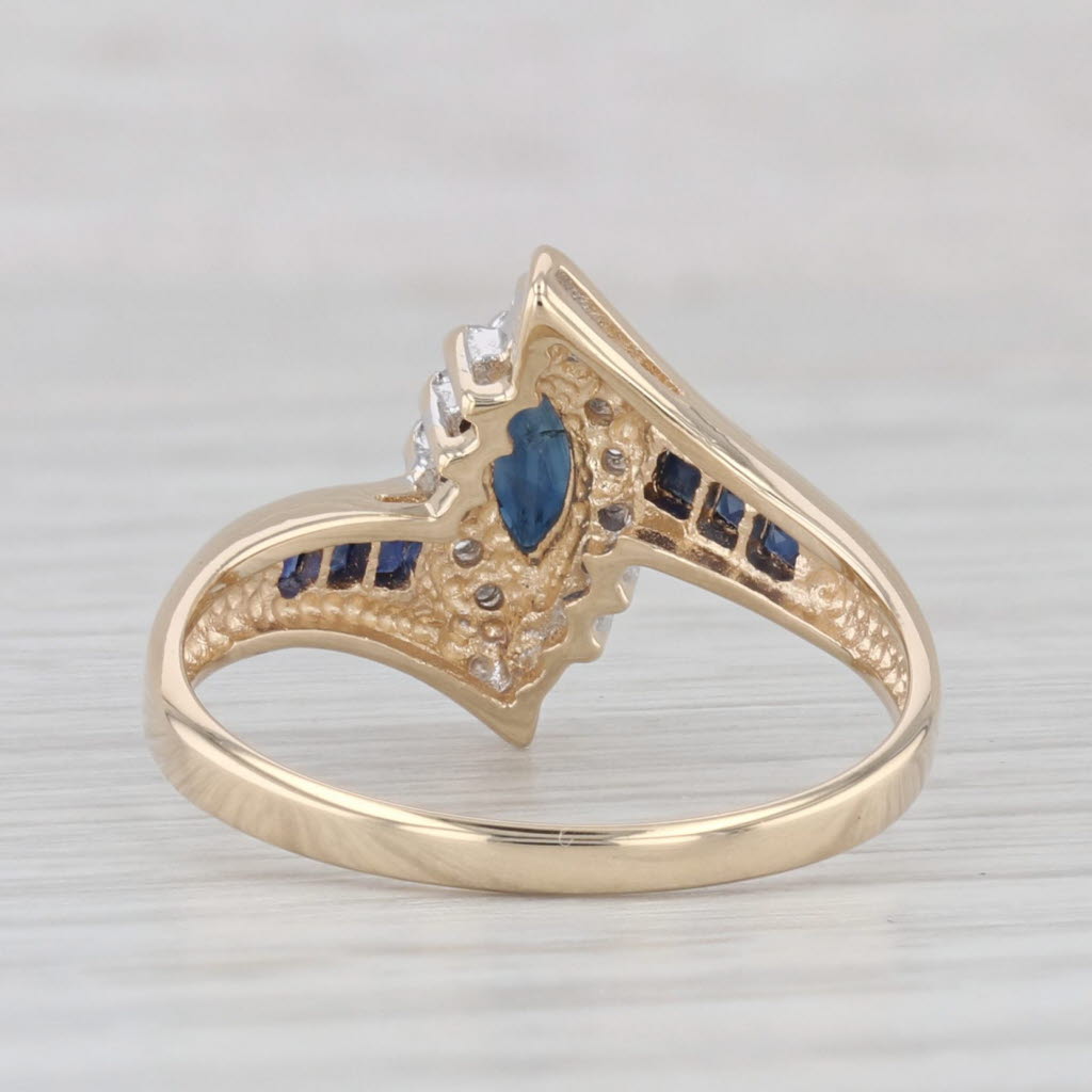 Light Gray 0.58ctw Marquise Blue Sapphire Diamond Bypass Ring 14k Yellow Gold Size 6