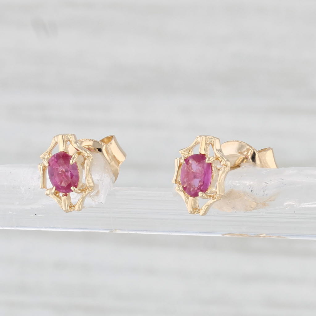 Light Gray 0.35ctw Oval Ruby Solitaire Earrings 14k Yellow Gold Studs