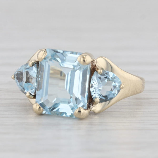 Light Gray 5.50ctw Emerald Cut Blue Topaz Ring 10k Yellow Gold Size 7