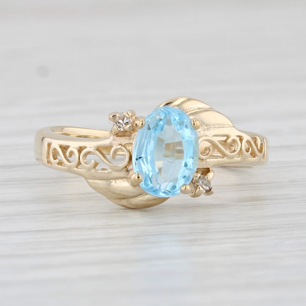 Light Gray 1.02ctw Oval Blue Topaz Diamond Ring 10k Yellow Gold Size 6.25