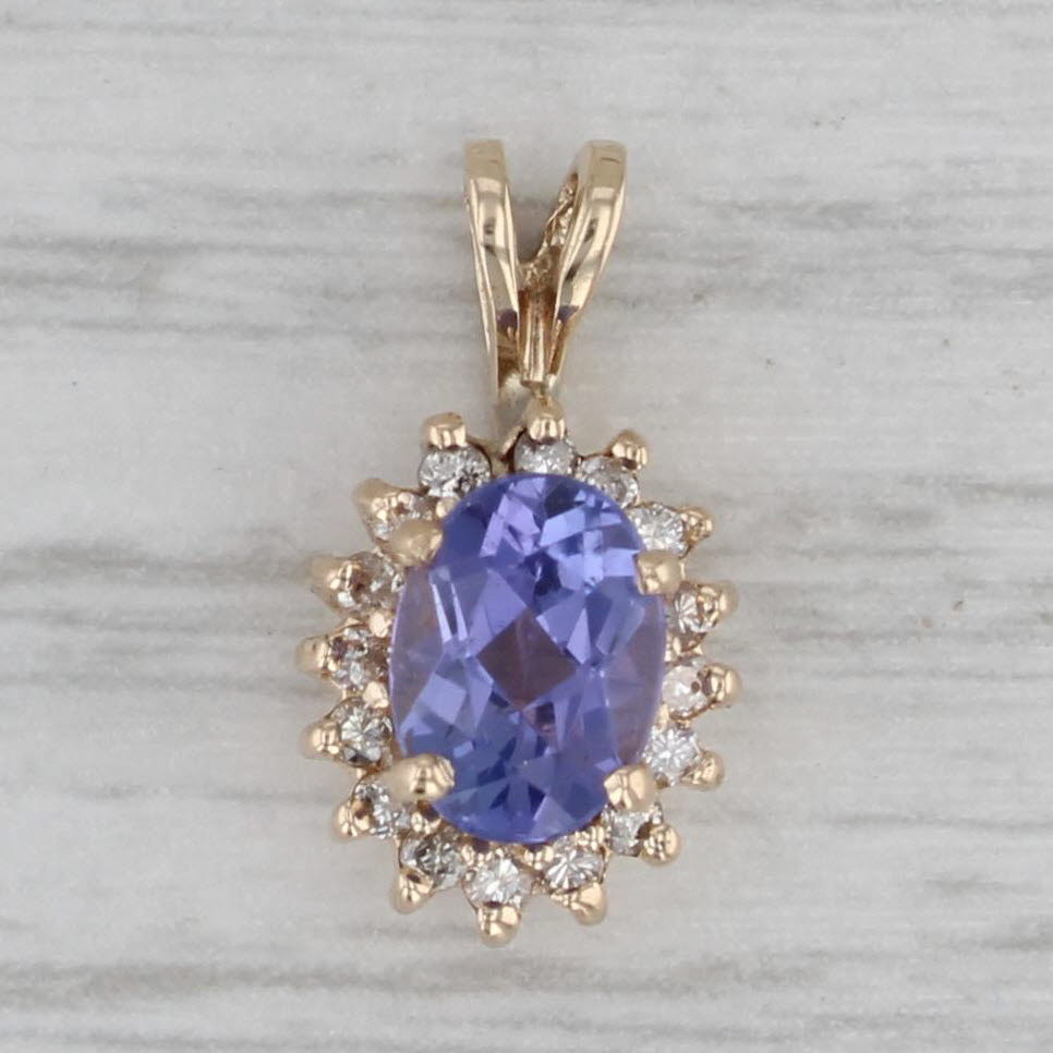 Gray 0.96ctw Oval Tanzanite Diamond Halo 14k Yellow Gold Pendant