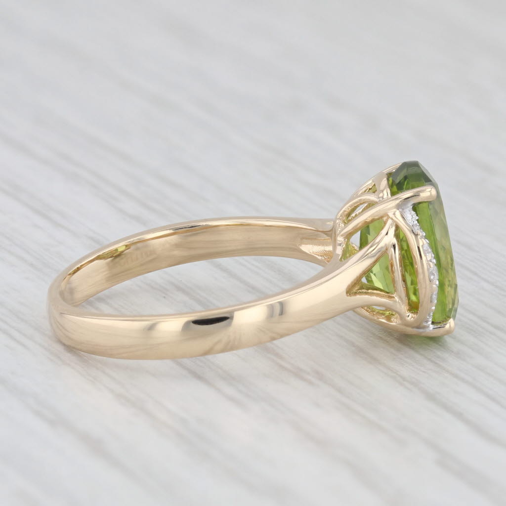 Light Gray 4.03ctw Oval Peridot Diamond Ring 14k Yellow Gold Size 7