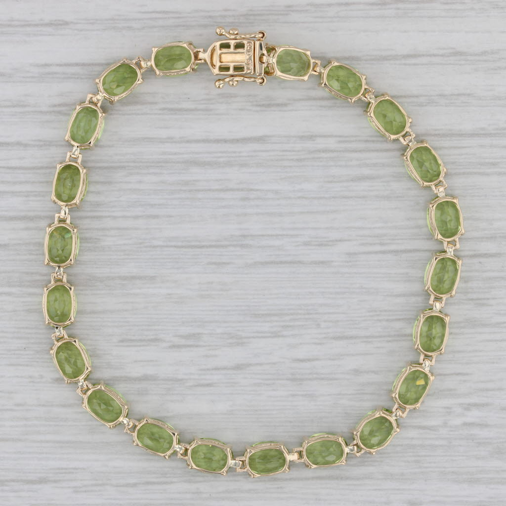 Gray 17.50ctw Peridot Tennis Bracelet 14k Yellow Gold 7.25" 5mm