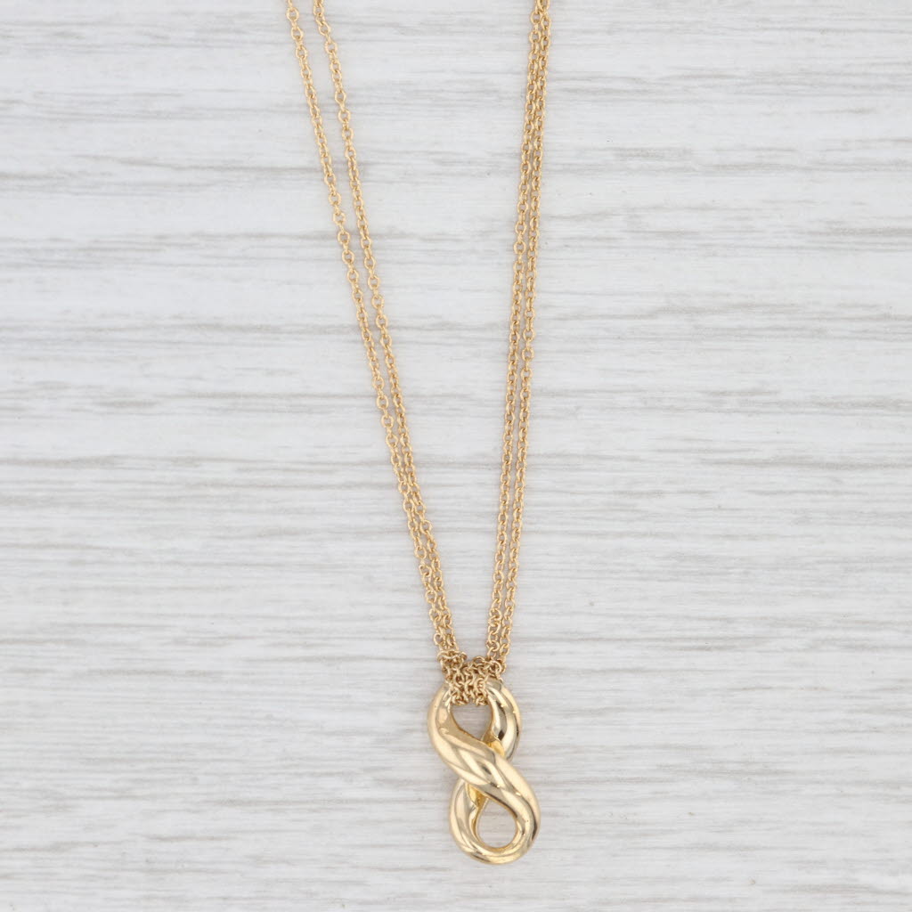 Light Gray Tiffany & Co Infinity Knot Pendant Necklace w/ Pouch 18k Yellow Gold 15.25"