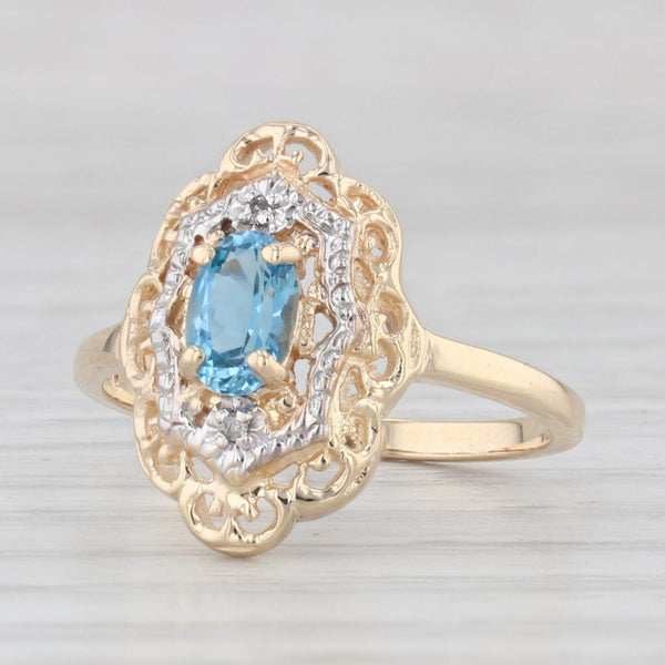 0.60ct Oval Blue Topaz Ring 10k Yellow Gold Size 6 Diamond Accents