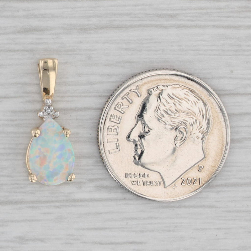 Lab Created Opal Teardrop Pendant 10k Yellow Gold Diamond Accent