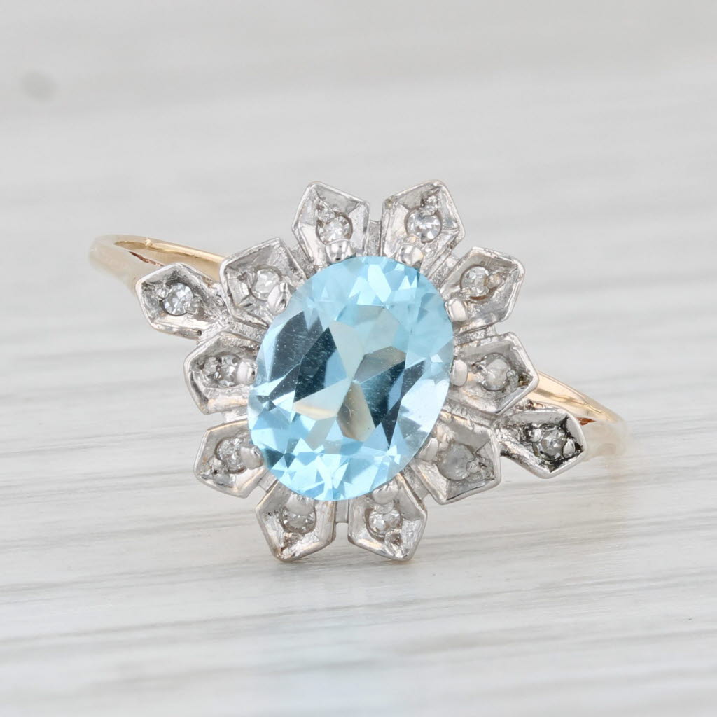 Light Gray 1.46ctw Oval Blue Topaz Diamond Ring 10k Yellow Gold Size 7.5