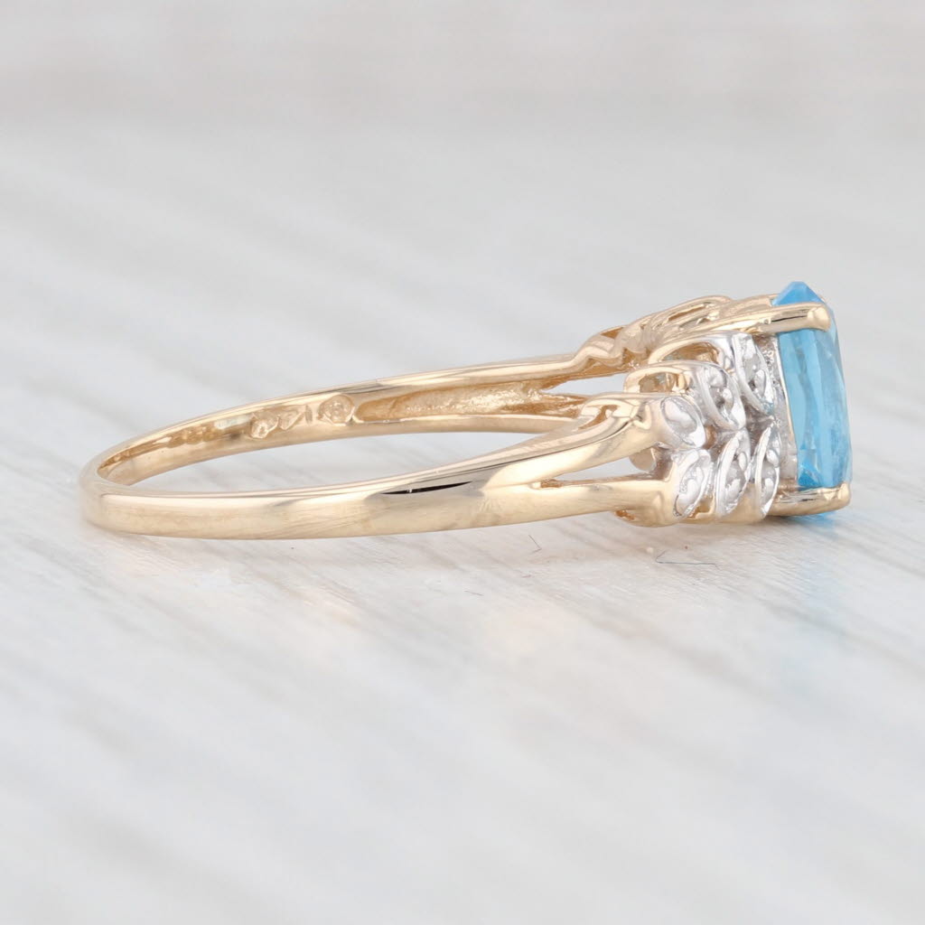 Light Gray 0.99ctw Oval Blue Topaz Diamond Ring 14k Yellow Gold Size 7