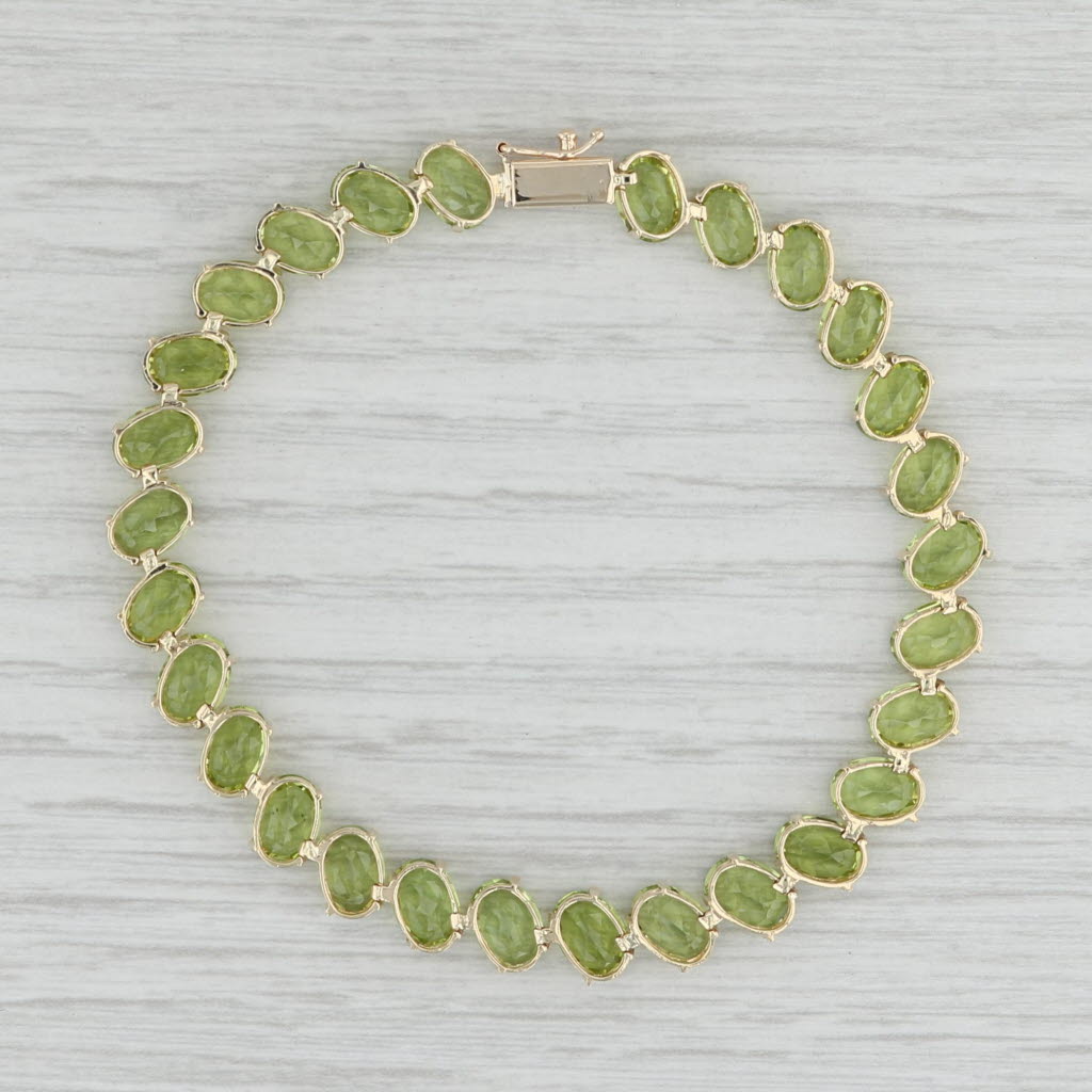 Light Gray 22.40ctw Peridot Tennis Bracelet 14k Yellow Gold 7.25" 7.3mm