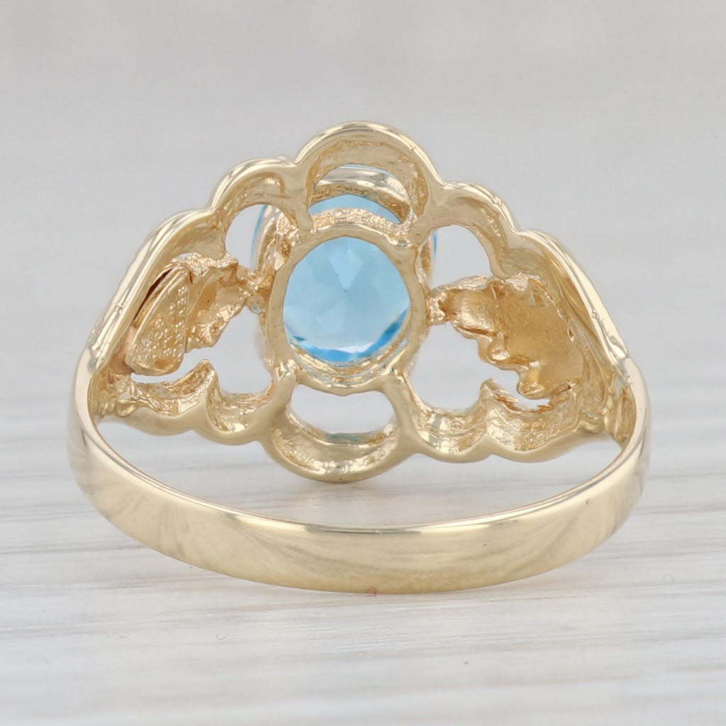 Light Gray 1.48ct Oval Blue Topaz Solitaire Floral Ring 14k Yellow Gold Size 7