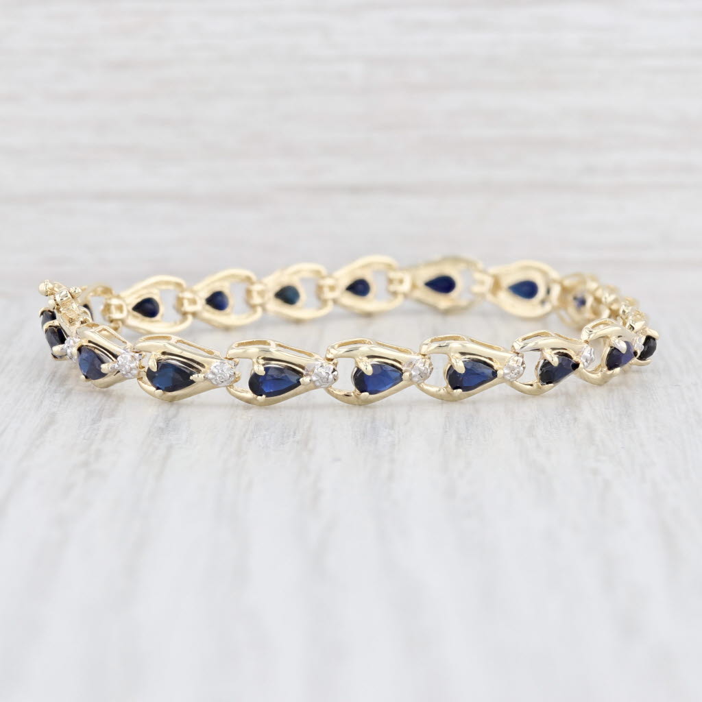 Light Gray 5.24ctw Lab Created Blue Sapphire Diamond Tennis Bracelet 10k Yellow Gold 6.75"