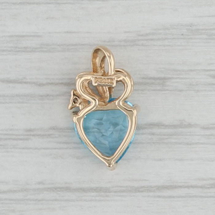 Gray 2.33ctw Blue Topaz Heart Pendant 14k Yellow Gold Diamond Accent