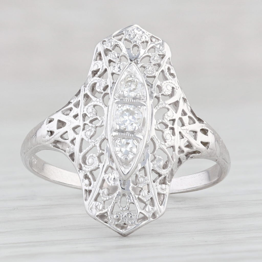 Light Gray Vintage 0.12ctw Diamond 3-Stone Filigree Ring 18k White Gold Size 9.5