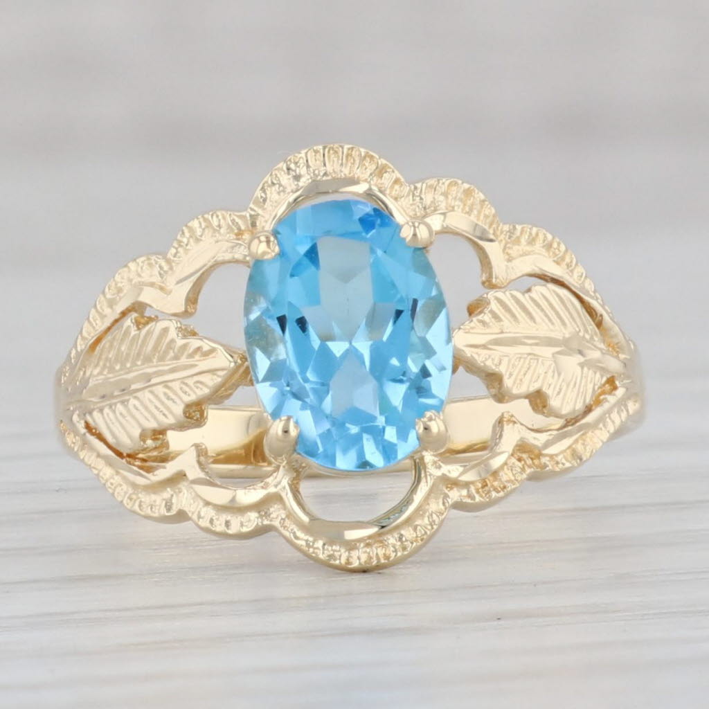 Gray 1.48ct Oval Blue Topaz Solitaire Floral Ring 14k Yellow Gold Size 7