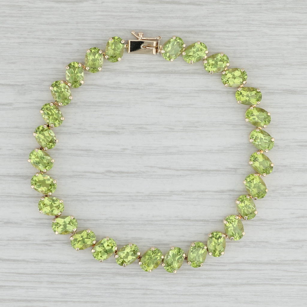 Light Gray 22.40ctw Peridot Tennis Bracelet 14k Yellow Gold 7.25" 7.3mm