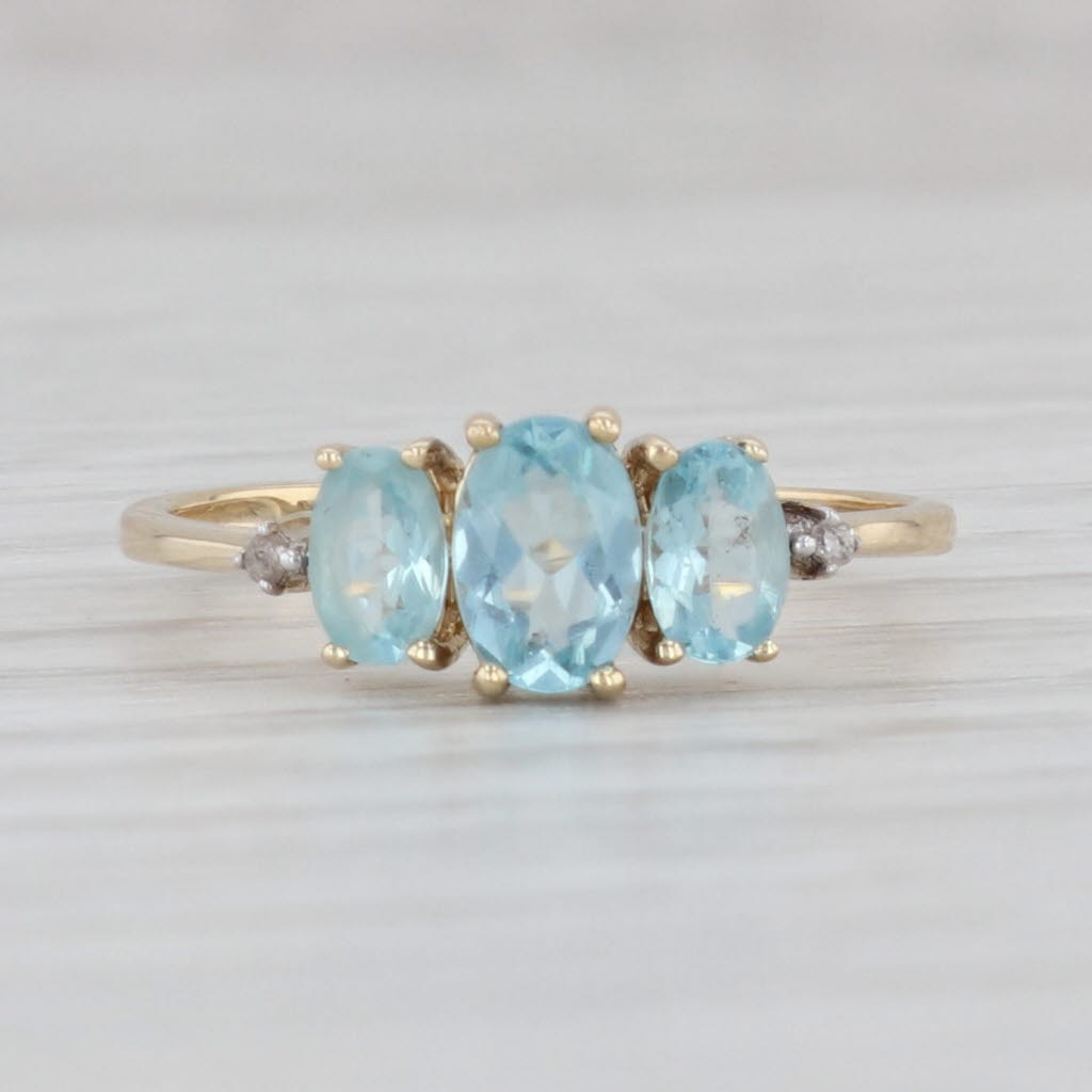 Light Gray 0.68ctw Blue Apatite 3-Stone Oval Ring 10k Yellow Gold Size 6.25