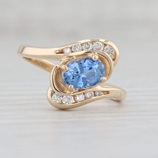Light Gray 1.43ctw Light Blue Oval Sapphire Diamond Bypass Ring 14k Yellow Gold Size 7.25