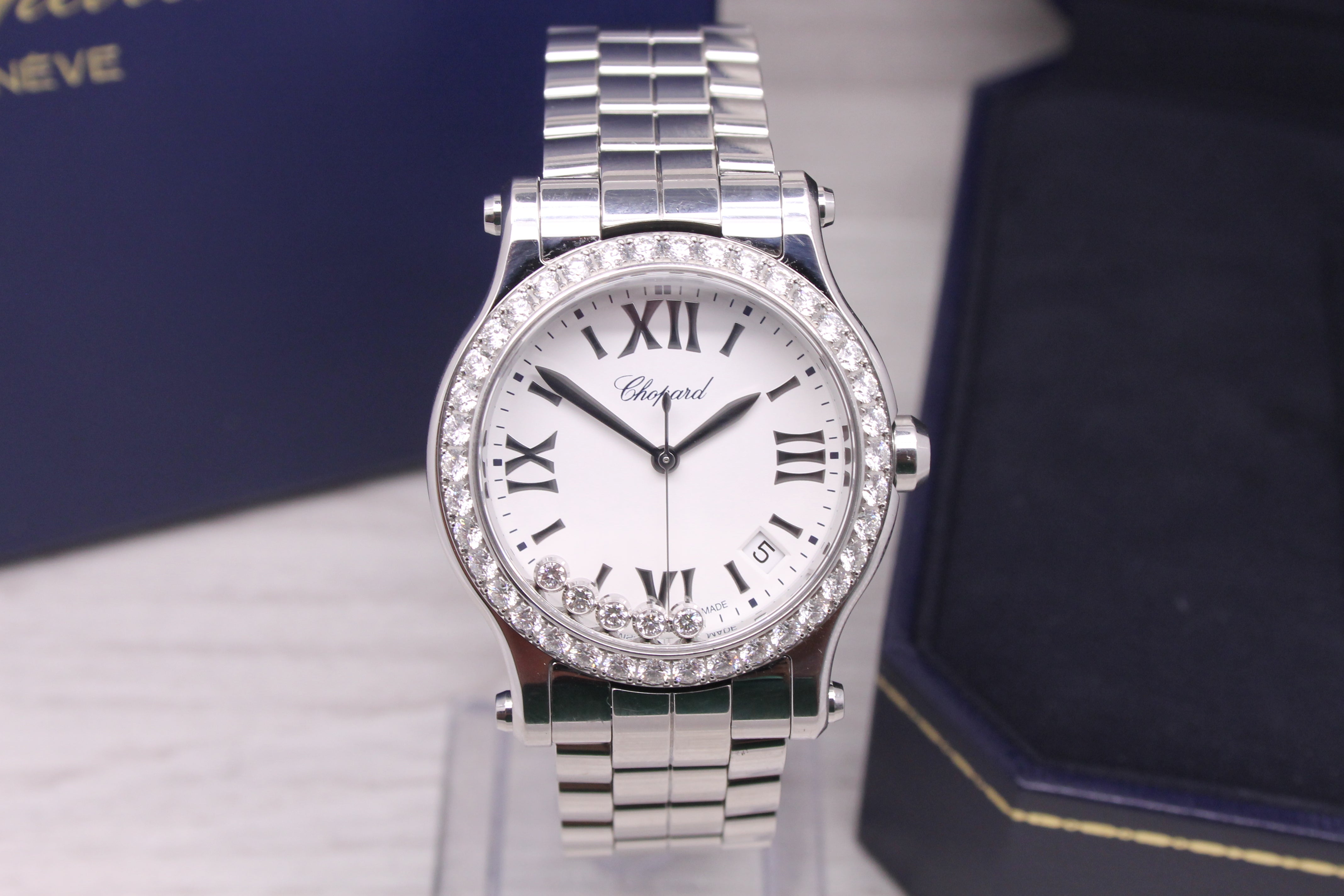 Floating diamond watch hotsell