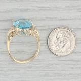Light Gray 10.29ctw Oval Blue Topaz Diamond Ring 14k Yellow Gold Size 7.25 Bypass
