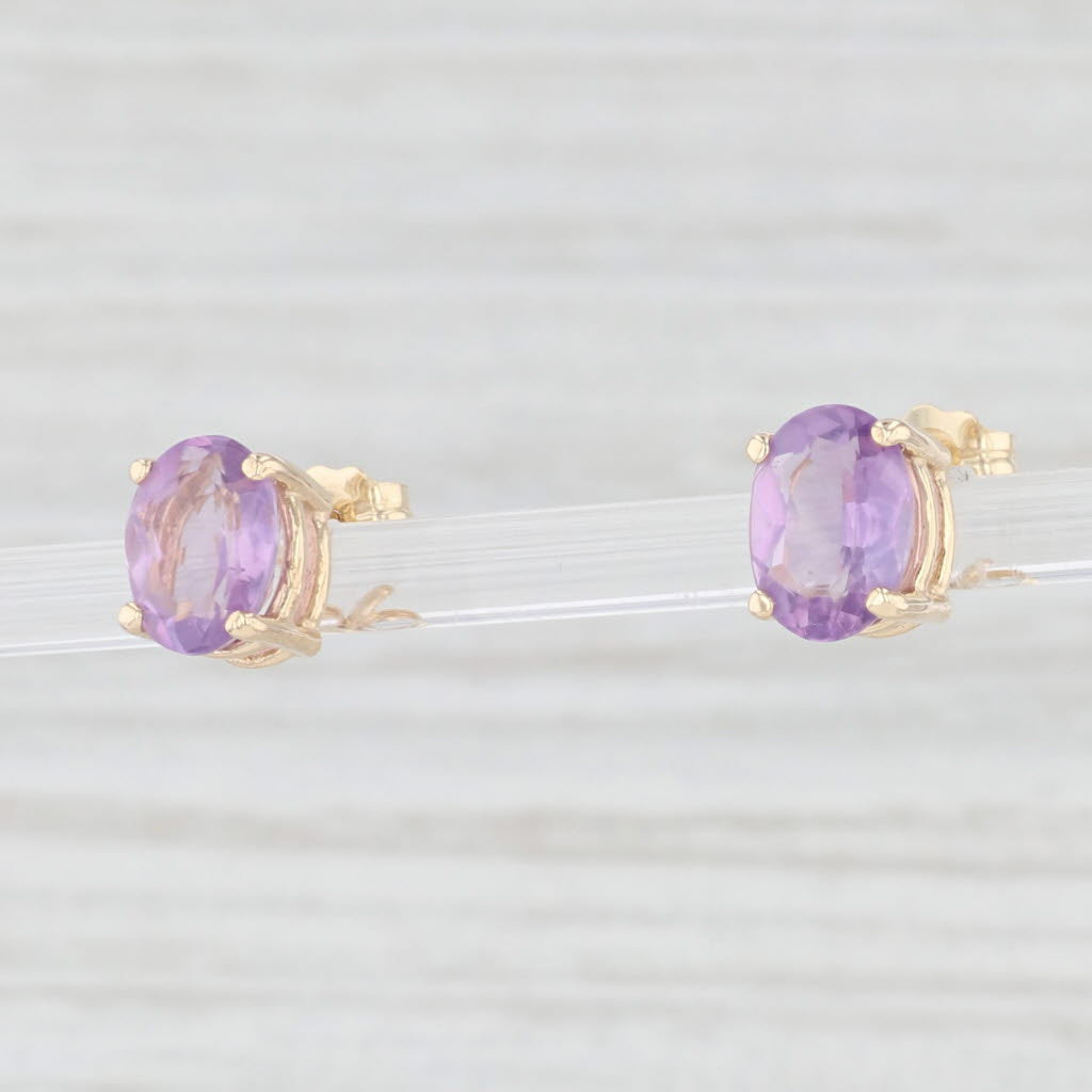 Light Gray 2.05ctw Oval Amethyst Stud Earrings 14k Yellow Gold February Birthstone