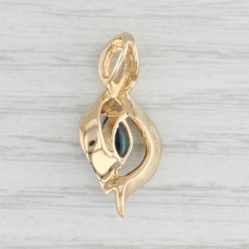 Light Gray 0.65ct London Blue Topaz Figure-8 Pendant 14k Yellow Gold