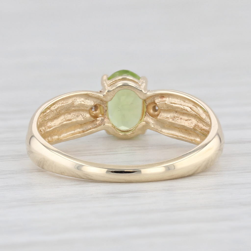 Light Gray 0.90ct Oval Peridot Solitaire Ring 10k Yellow Gold Size 7.25 Diamond Accents