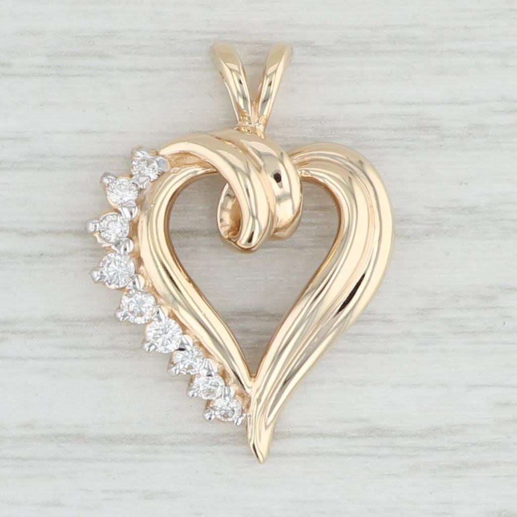 Light Gray 0.26ctw VS2 Diamond Open Heart Pendant 14k Yellow Gold