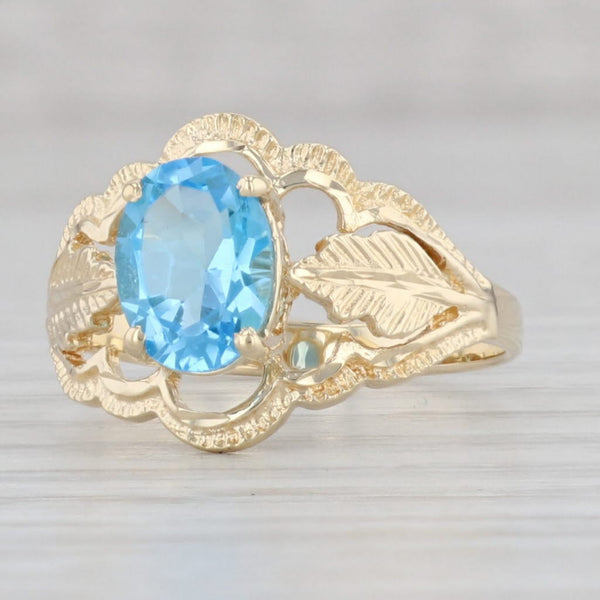 Light Gray 1.48ct Oval Blue Topaz Solitaire Floral Ring 14k Yellow Gold Size 7