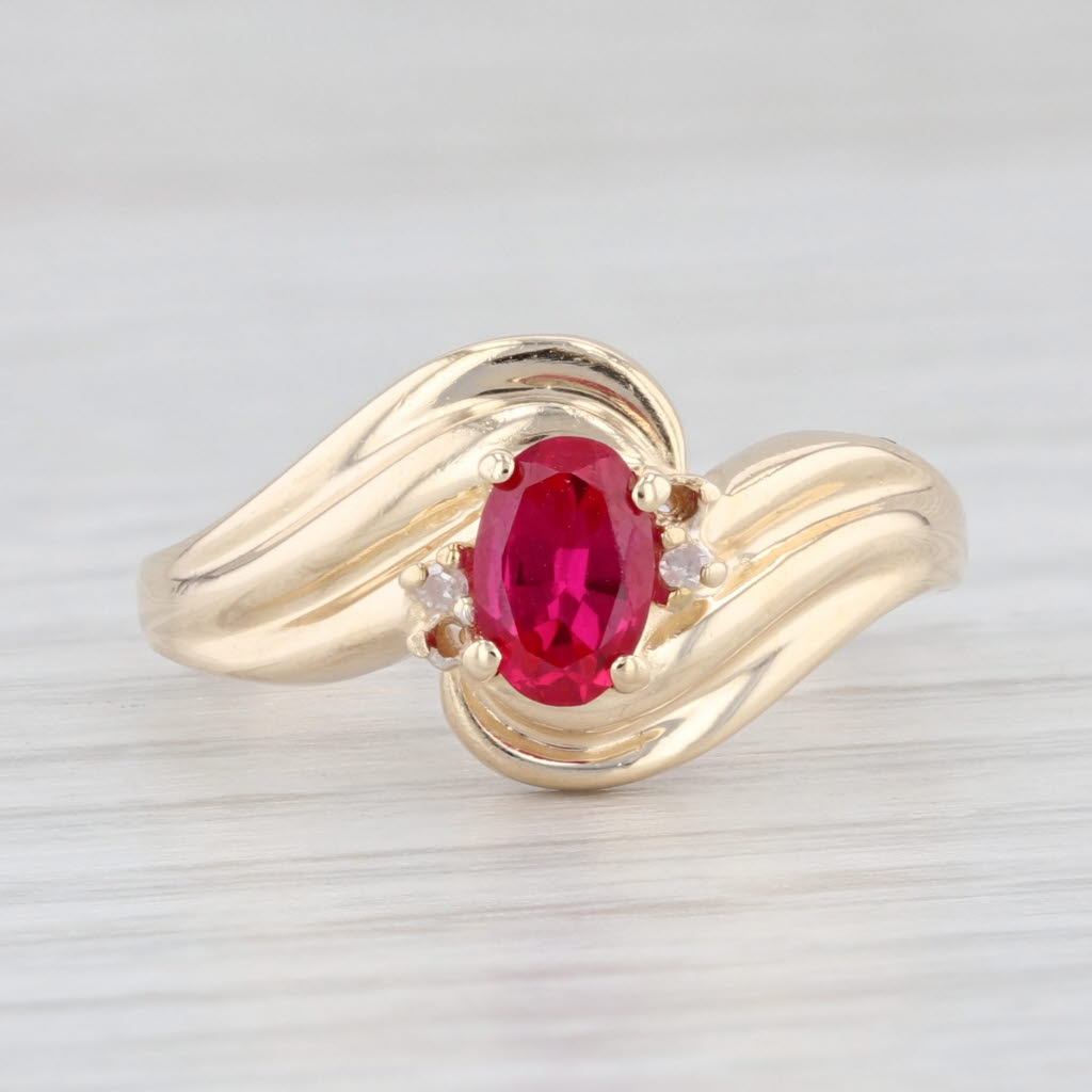 Light Gray 0.60ct Oval Lab Created Ruby Bypass Ring 10k Yellow Gold Size 6.5 Diamonds