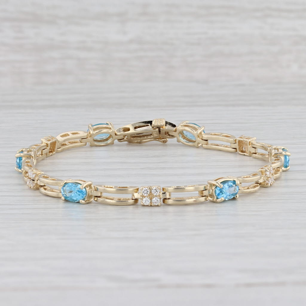 Light Gray 3.82ctw Oval Blue Topaz Diamond Tennis Bracelet 14k Yellow Gold 6.75" 4.5mm