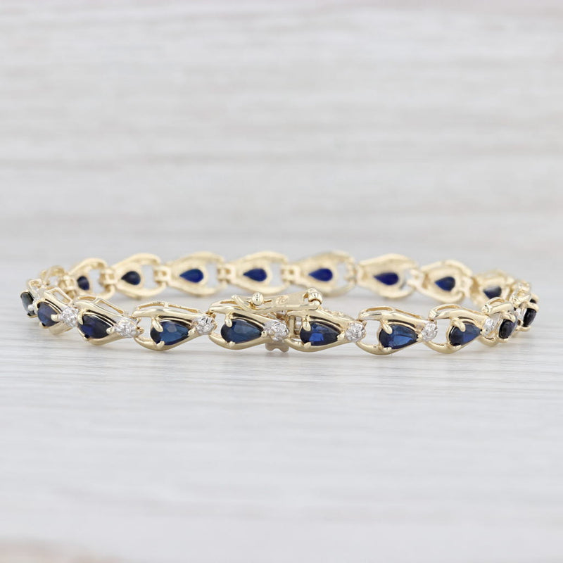 Light Gray 5.24ctw Lab Created Blue Sapphire Diamond Tennis Bracelet 10k Yellow Gold 6.75"