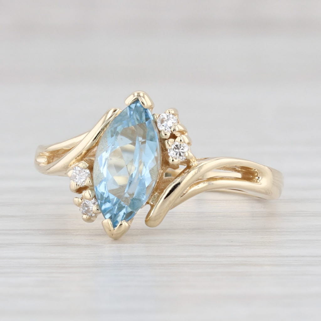 Light Gray 1.15ctw Marquise Aquamarine Diamond Bypass Ring 14k Yellow Gold Size 6.75