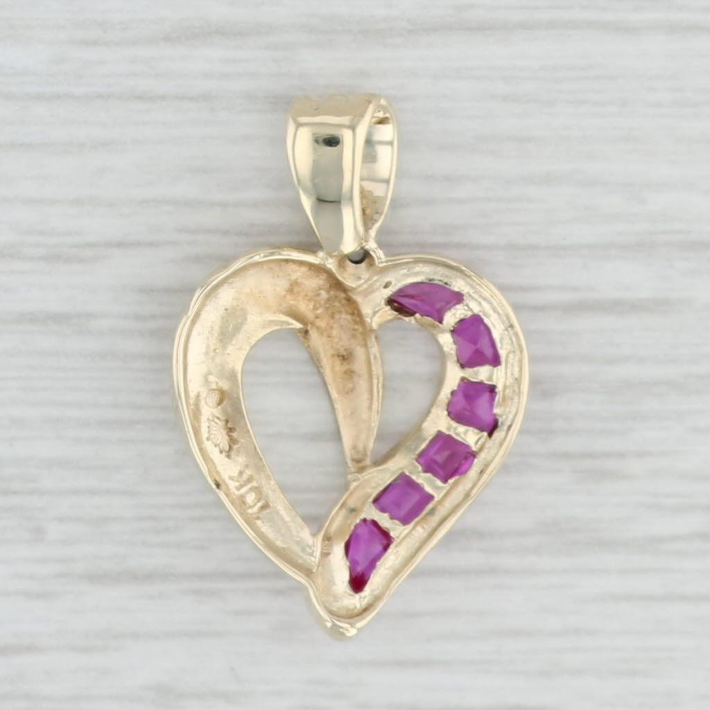 Light Gray 0.68ctw Lab Created Ruby Diamond Heart pendant 10k Yellow Gold