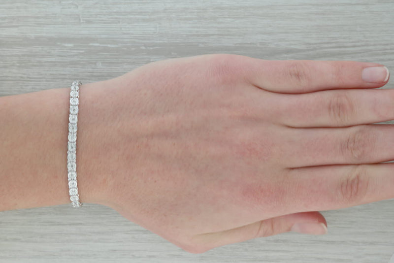 0.15ctw Diamond Tennis Bracelet Heart Charm 10k White Gold 6.75"