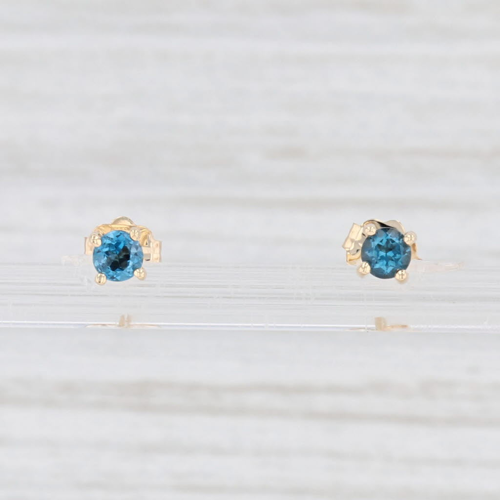 Light Gray New 0.28ctw London Blue Topaz Stud Earrings 14k Yellow Gold Round Solitaires