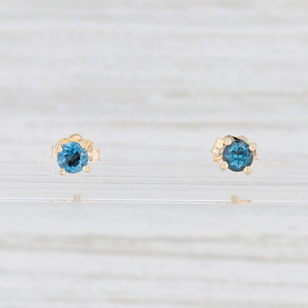 Light Gray New 0.28ctw London Blue Topaz Stud Earrings 14k Yellow Gold Round Solitaires