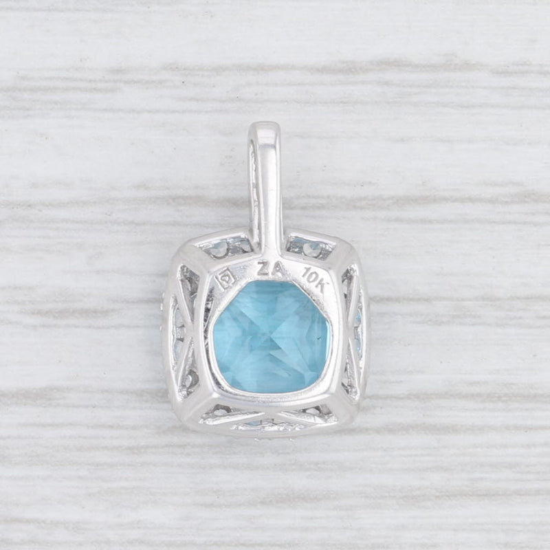 New Blue Topaz Synthetic White Sapphire 4.40ctw Halo Pendant 10k White Gold