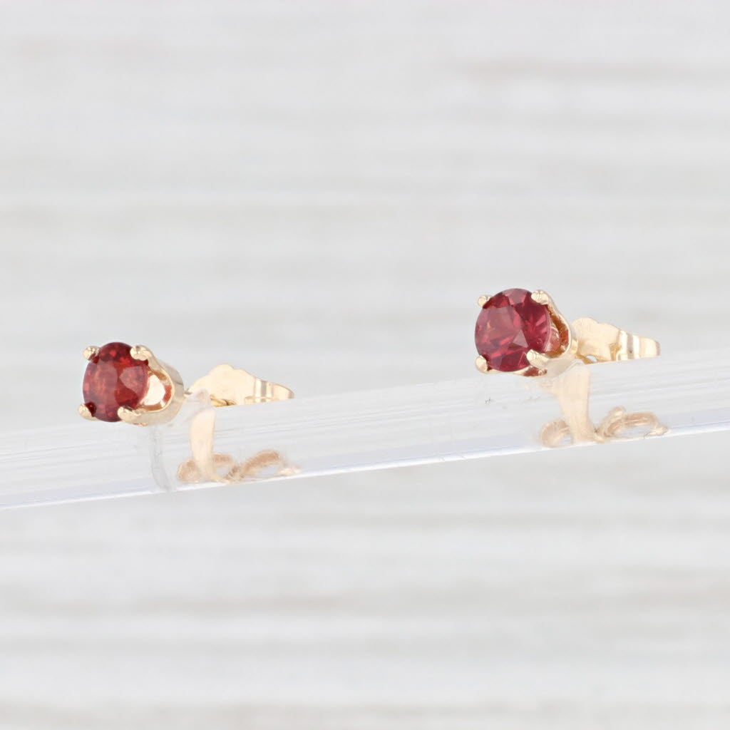 Light Gray 0.68ctw Garnet Solitaire Stud Earrings 14k Yellow Gold January Birthstone